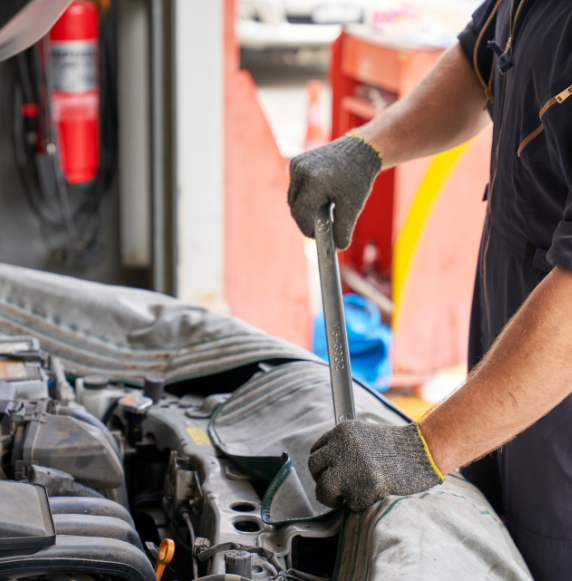 Mechanic man try to repair engine
